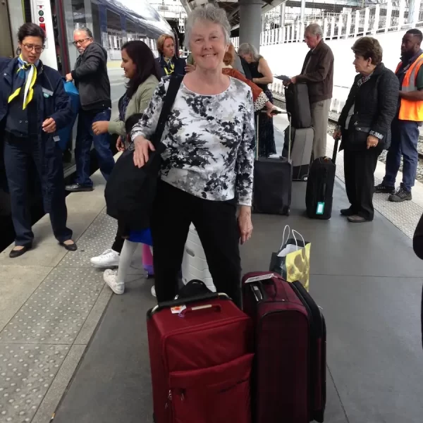 Cathy with suitcases ready to board the Eurostar from London